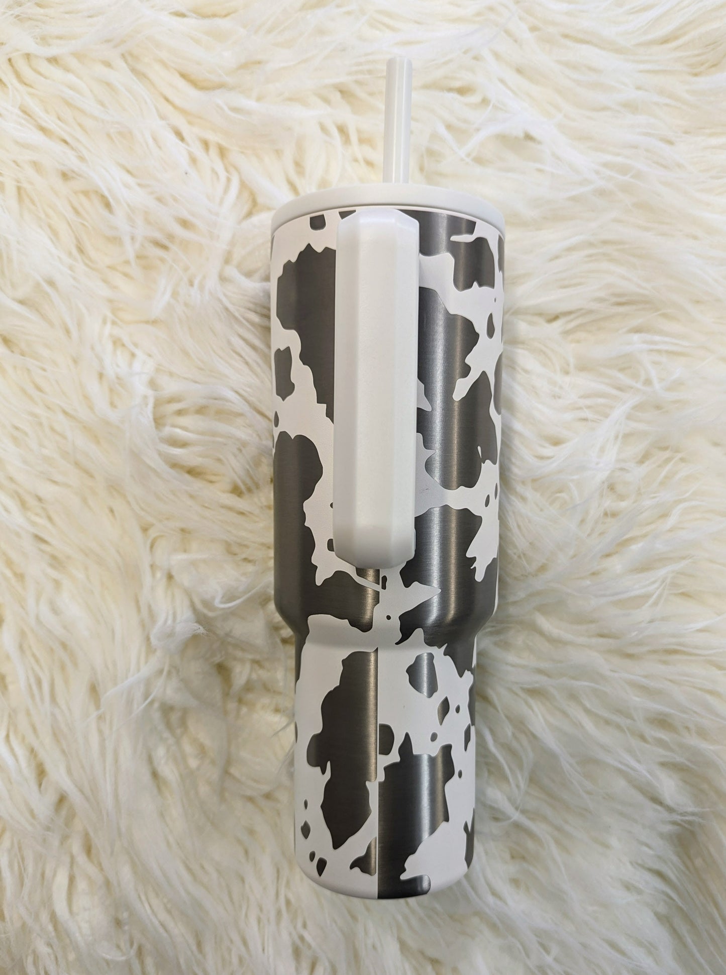 Cow print pattern engraved on white 40 oz insulated tumbler with handle by Simple Modern