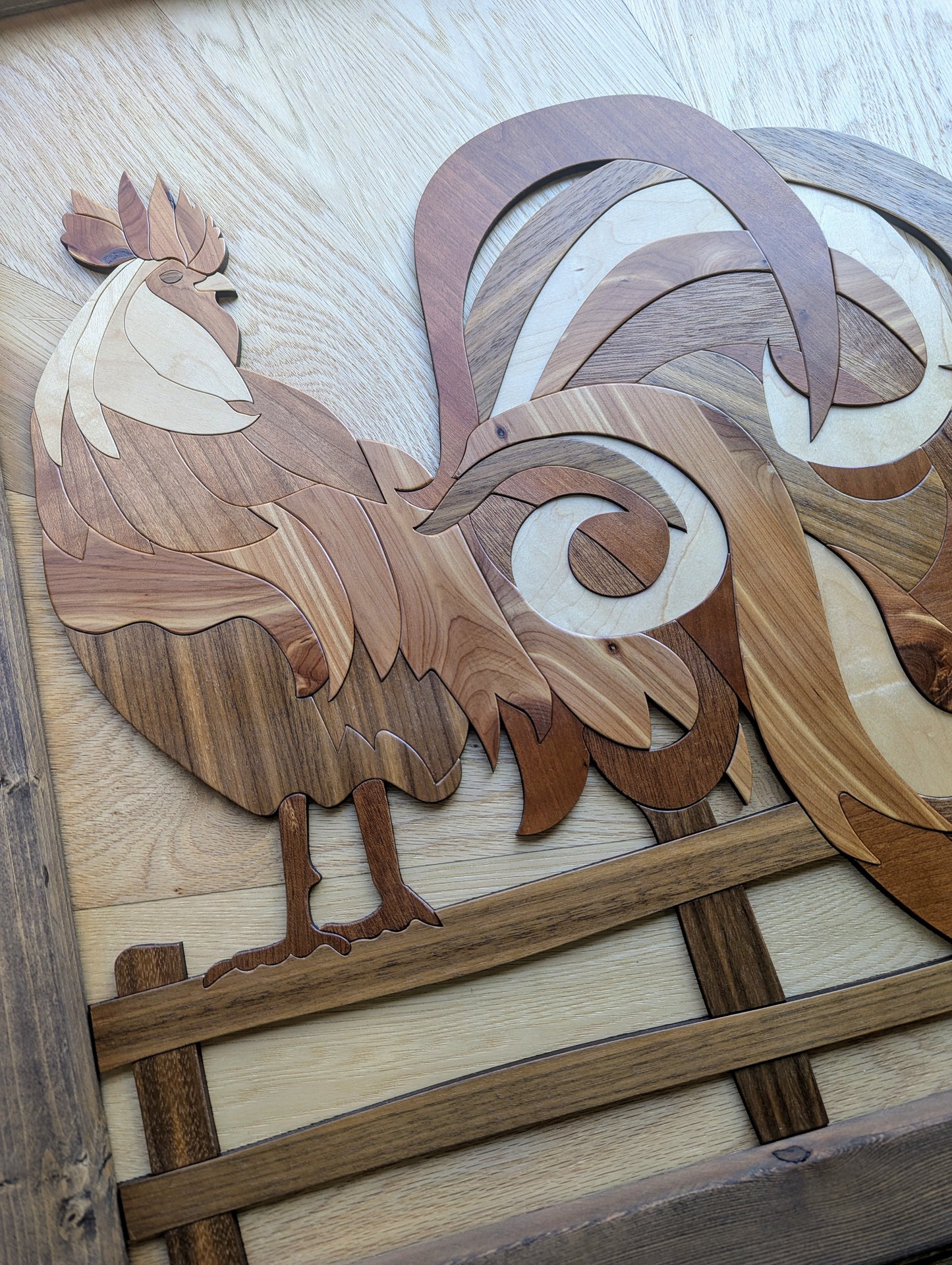 Angled view of wooden rooster wall art highlighting depth, texture, and layered veneer design.