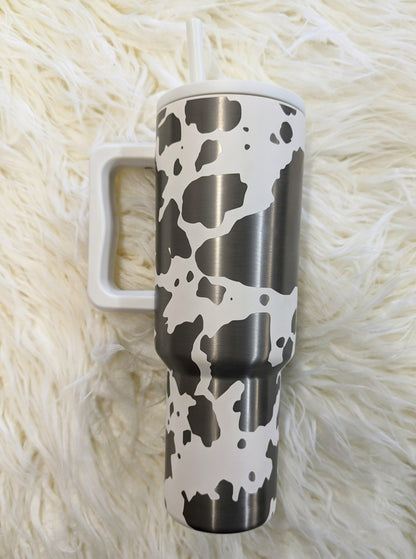 Cow print pattern engraved on white 40 oz insulated tumbler with handle by Simple Modern