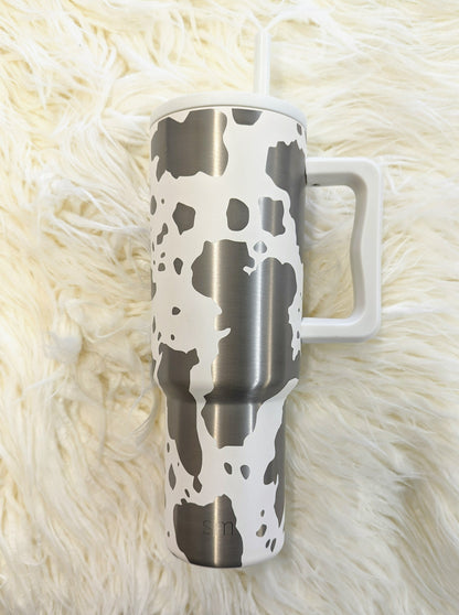 Cow print pattern engraved on white 40 oz insulated tumbler with handle by Simple Modern