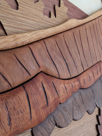 Close-up of wooden wings from eagle wall art