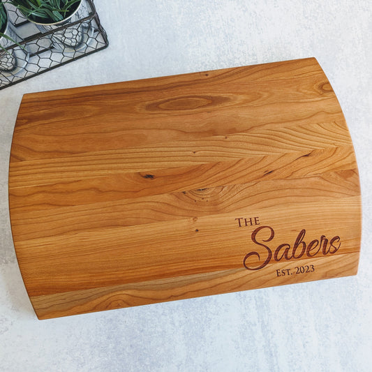 Personalized cutting board with last name