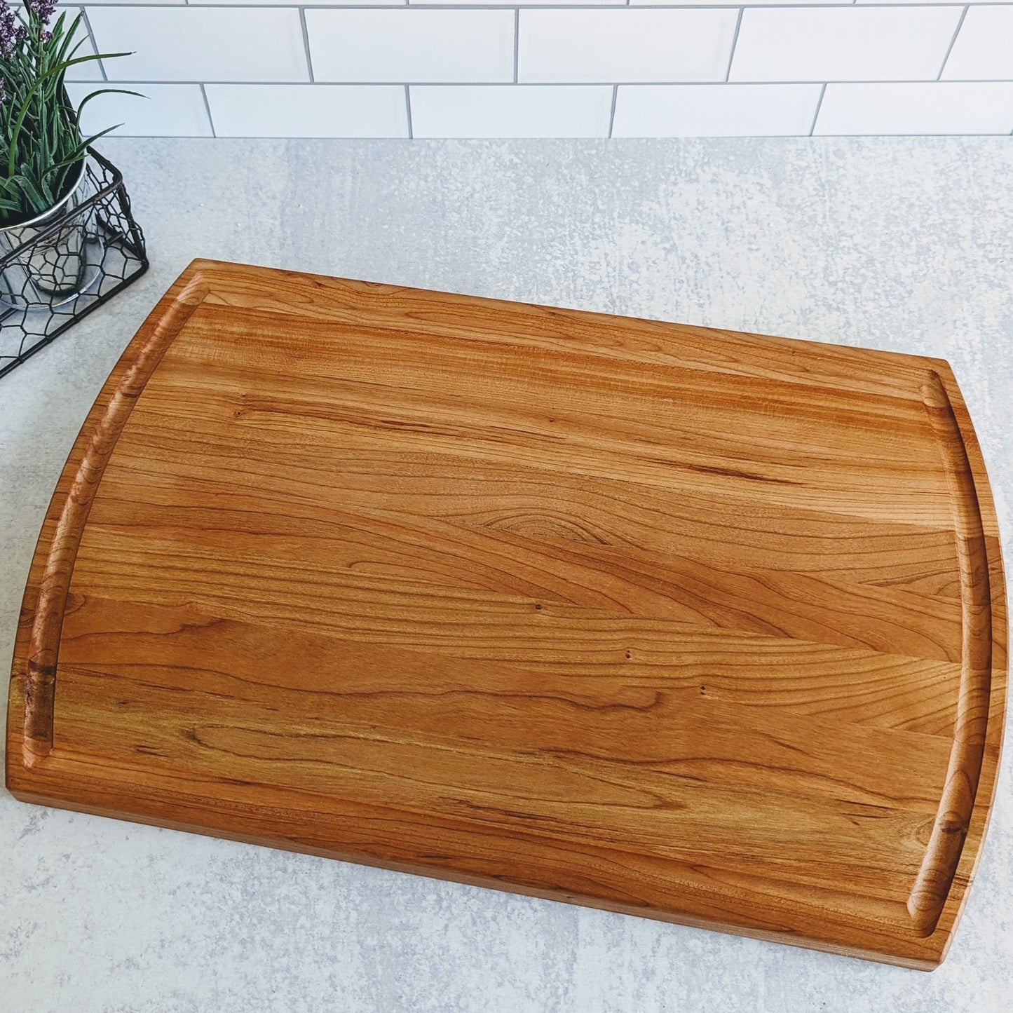 Personalized cutting board with last name