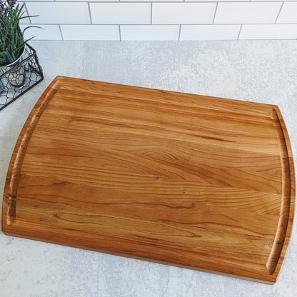 Personalized cutting board with last name