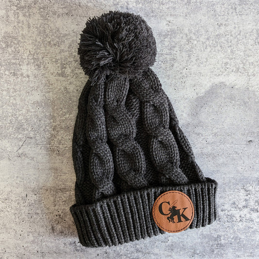 Chunky cable knit pom beanie | CK patch